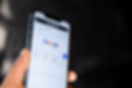 A phone screen with google search screen on it